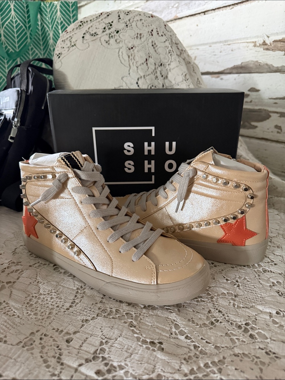 ShuShop Metallic Cream High-Top Sneakers with Orange Star